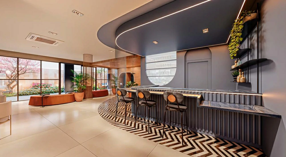 Lobby do Verde Città com espaço de convivência